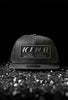 KING SHOCKS 9FIFTY BLACK W/ BLACK CHROME LOGO (SNAPBACK) PT# APP-SB003
